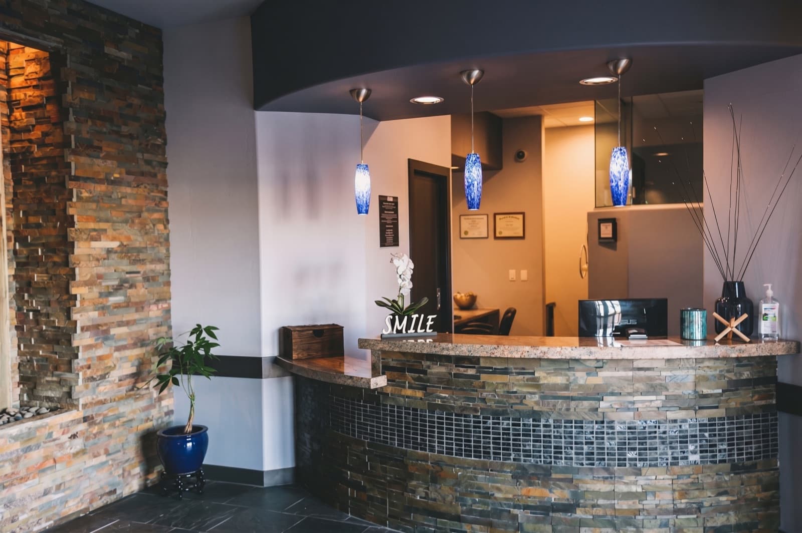 Smiles by Goh — reception, welcoming a new patient in